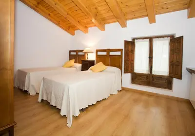 Cama o camas de una habitación en El Molino de la Hiedra