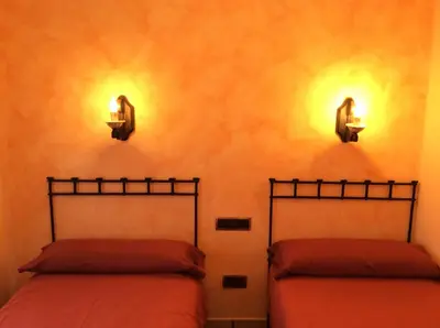 Cama o camas de una habitación en Casa Rural Sierra Vicor