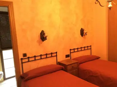 Cama o camas de una habitación en Casa Rural Sierra Vicor