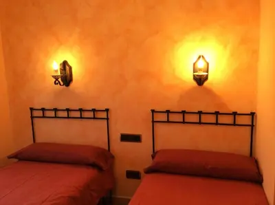 Cama o camas de una habitación en Casa Rural Sierra Vicor