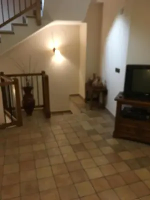 Una televisión o centro de entretenimiento en Casa OROSIA