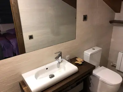 Un baño de Casa FOR HABITACIONES