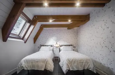 Cama o camas de una habitación en Casa Natal del Gigante de Sallent