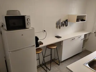 Una cocina o zona de cocina en Céntrico y equipado apartamento