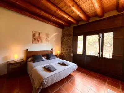 Cama o camas de una habitación en Apartaments Terraferma - L'Amfitriona
