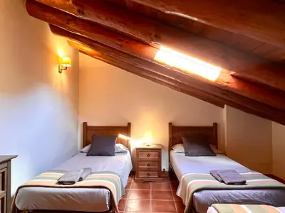Cama o camas de una habitación en Apartaments Terraferma - L'Amfitriona