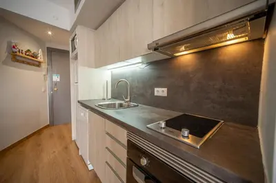 Una cocina o zona de cocina en Apartamento con Encanto Baqueira 1500