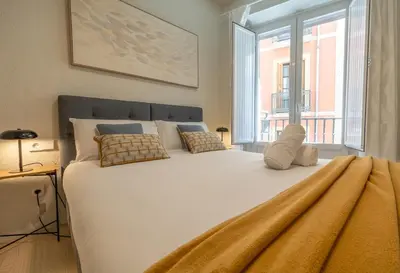 Cama o camas de una habitación en Zapatería 30 by Clabao