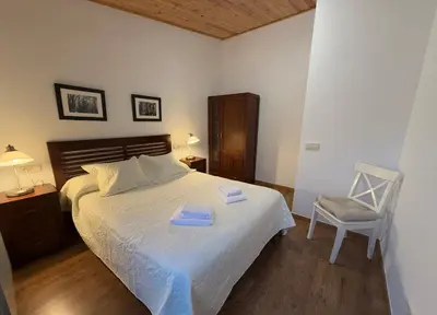 Cama o camas de una habitación en APARTAMENTOS RioMonte 4