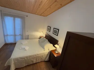 Cama o camas de una habitación en APARTAMENTOS RioMonte 4