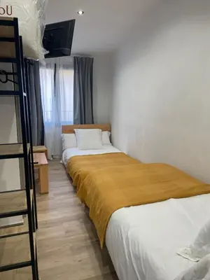 Cama o camas de una habitación en El Portalet