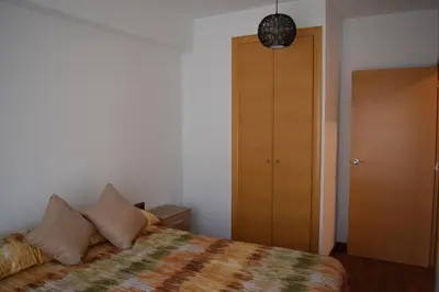 Cama o camas de una habitación en Benissanet Tarragona Apartment Cal Sanet