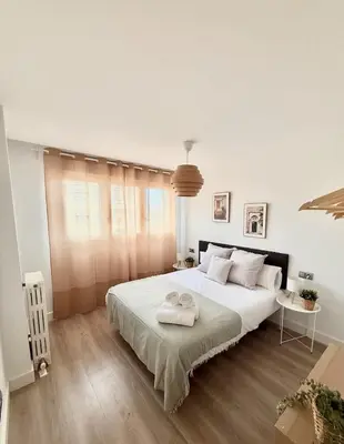 Cama o camas de una habitación en Vive Zaragoza XII