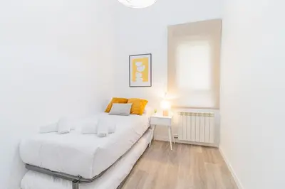 Cama o camas de una habitación en Your luxury getaway in downtown Zaragoza