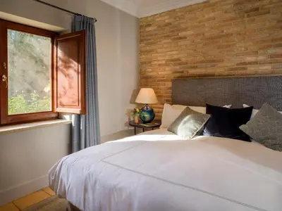 Cama o camas de una habitación en La Torre del Visco - Relais & Châteaux
