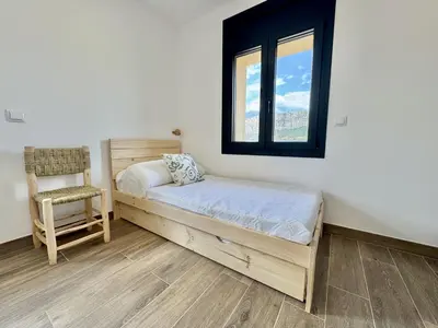Cama o camas de una habitación en Casa Cal Canó