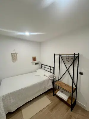 Cama o camas de una habitación en Apartamentos Rurales Miguela