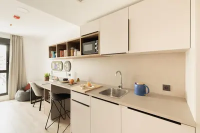 Una cocina o zona de cocina en Canvas Pamplona Plazaola