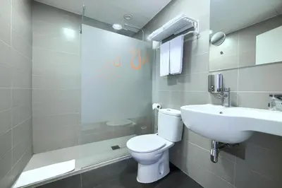 Un baño de Hotel Luze El Villa