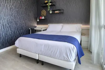 Cama o camas de una habitación en Hotel Luze El Villa