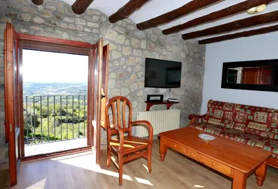 Una televisión o centro de entretenimiento en Casa rural La Siasa