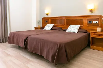 Cama o camas de una habitación en Hotel SNÖ Condes del Pallars