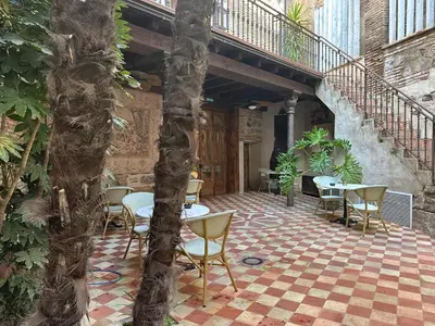 Un patio o zona al aire libre en 5 Sentidos - Suites de Lujo