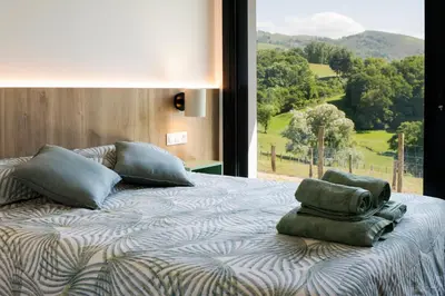 Cama o camas de una habitación en Hegoalde