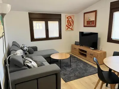 Una televisión o centro de entretenimiento en Casa Bertolo