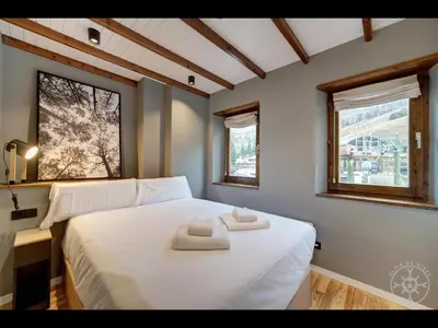 Cama o camas de una habitación en CAP D'ARAN de Alma de Nieve