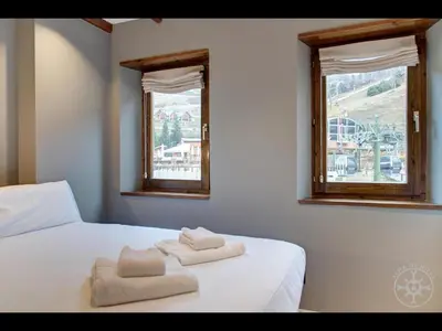Cama o camas de una habitación en CAP D'ARAN de Alma de Nieve