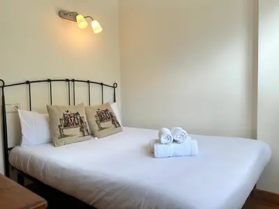 Cama o camas de una habitación en Apartament lluminós de muntanya by RURAL D'ÀNEU