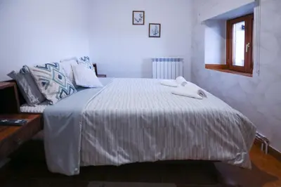Cama o camas de una habitación en La casita de Elizabeth