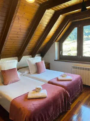 Cama o camas de una habitación en Apartamento a 5 minutos de pistas y con vistas panorámicas