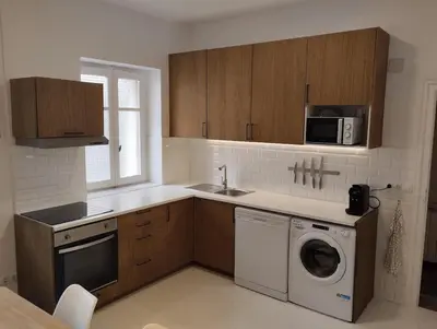 Una cocina o zona de cocina en Amplio piso en casa histórica en primera planta