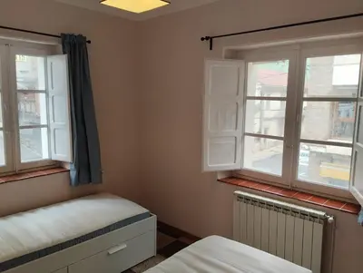 Cama o camas de una habitación en Amplio piso en casa histórica en primera planta