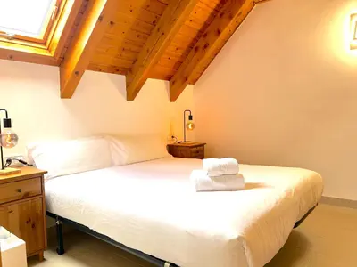 Cama o camas de una habitación en Dúplex acollidor i rústic a Espot by RURAL D'ÀNEU