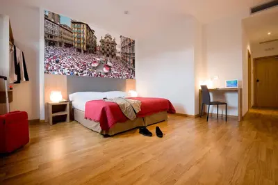 Cama o camas de una habitación en IRAIPE Pamplona Hostal Auto Check-in