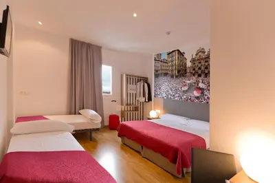 Cama o camas de una habitación en IRAIPE Pamplona Hostal Auto Check-in