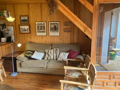 Zona de estar de La casita de madera
