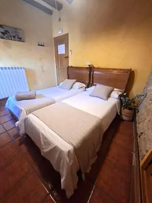 Cama o camas de una habitación en Casa Rural Arco Navarra