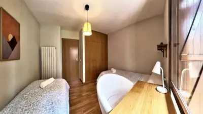 Cama o camas de una habitación en TenaGune - tucasaenlospirineos