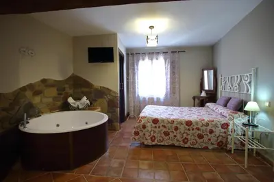 Cama o camas de una habitación en Casa Rural La Tejada