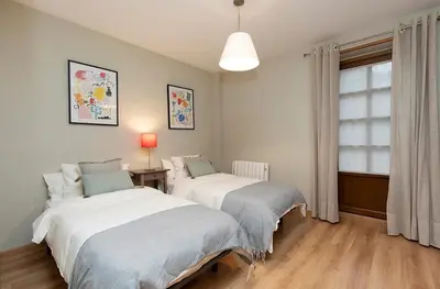 Cama o camas de una habitación en El Bosque del Sapo