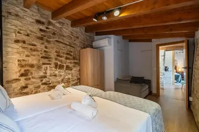 Cama o camas de una habitación en La Caseta de Freixenet Encanto rural y natural