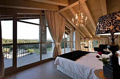 Cama o camas de una habitación en La Vella Farga Hotel