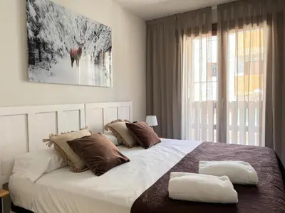 Cama o camas de una habitación en Villa Aneto - Confort moderno en el corazón de Benasque