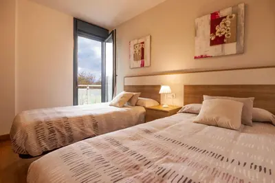 Cama o camas de una habitación en Apartamento Baztan Berri