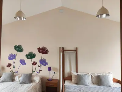 Cama o camas de una habitación en El Sendero