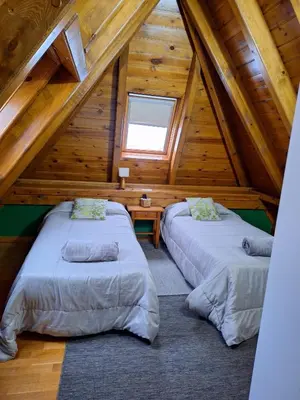 Cama o camas de una habitación en Ostau ERA NHEUADA VALLE DE ARAN